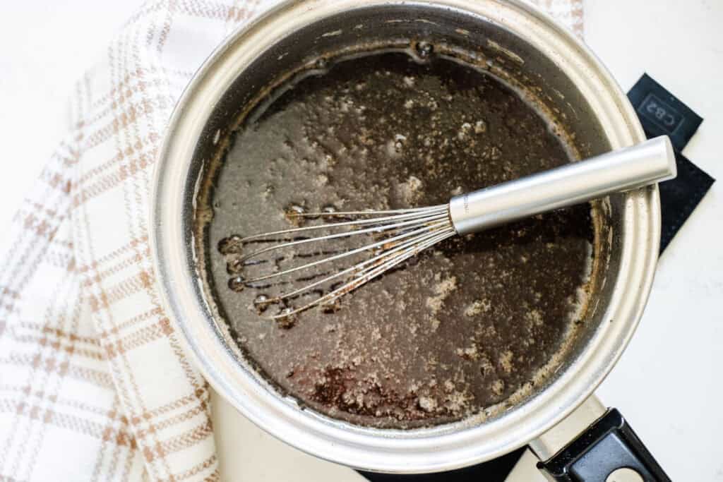 syrup mixture simmering in a saucepan