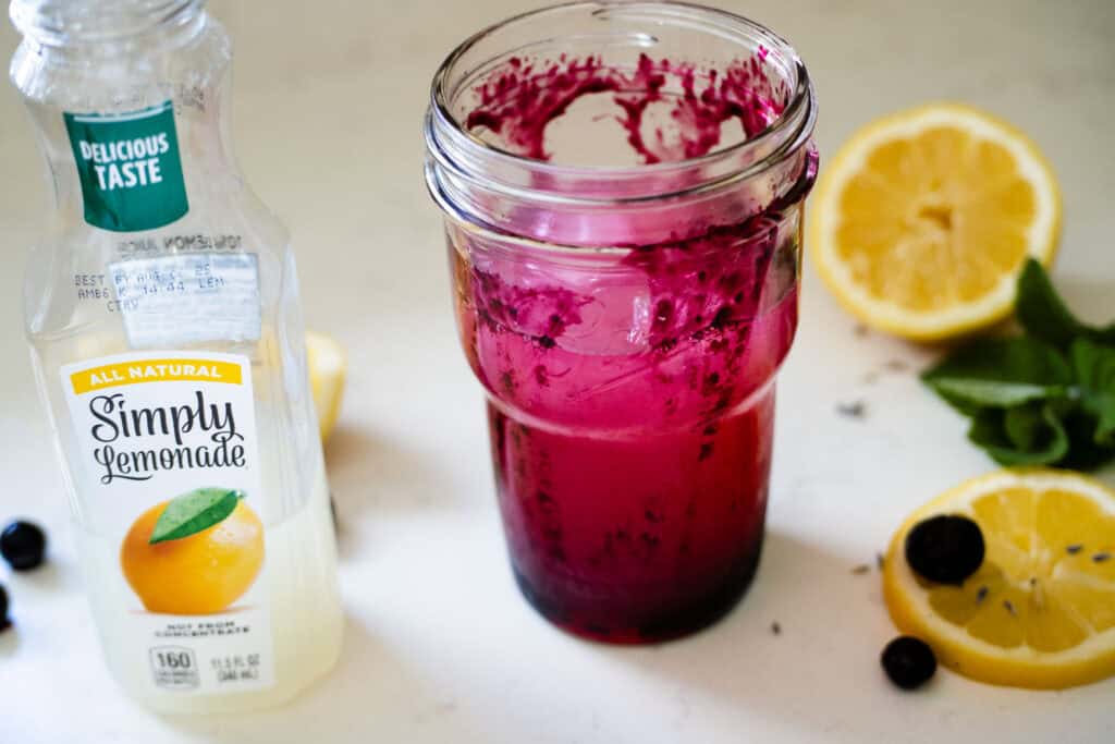 lemonade and lavender syrup added to cup