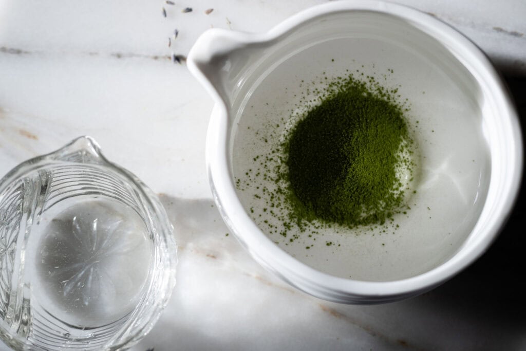 water and sifted matcha powder
