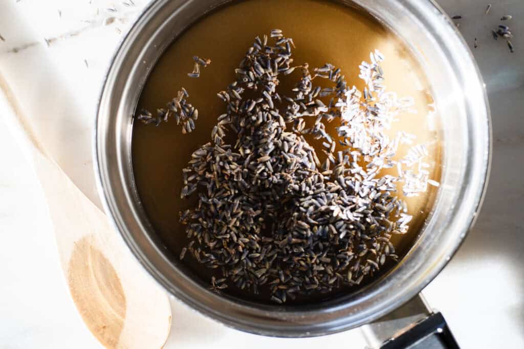 water, sugar, and lavender in a saucepan