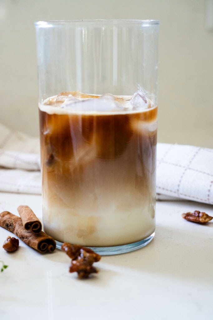 espresso poured over ice and milk