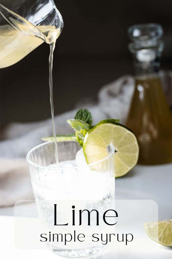 lime simple syrup being poured into a drink