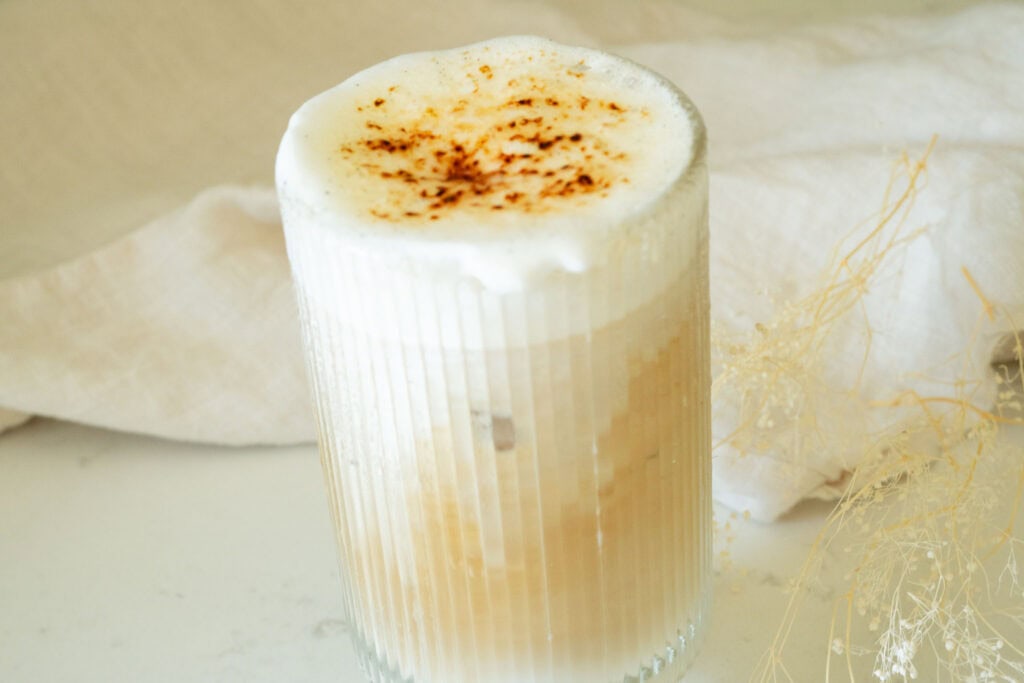 iced latte with a caramelized cold foam