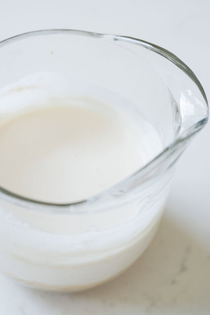 whipped cold foam in a pitcher