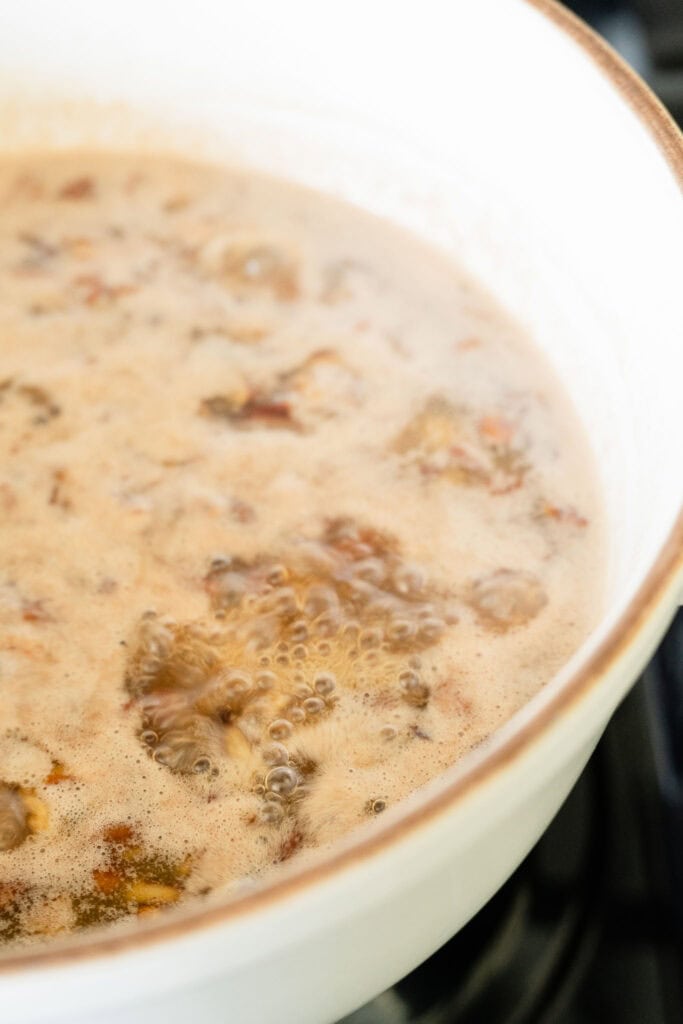 toasted pecan added to a simmering syrup