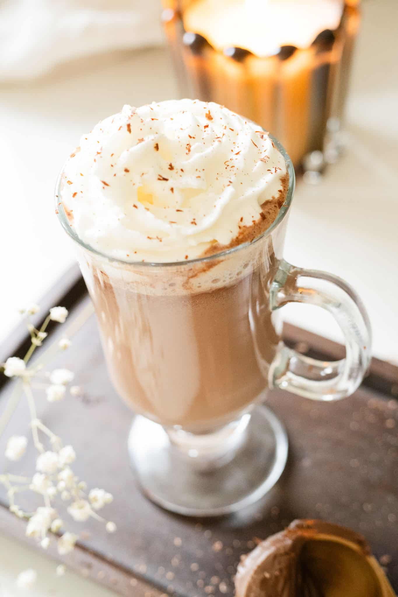 mug with hot chocolate topped with whipped cream