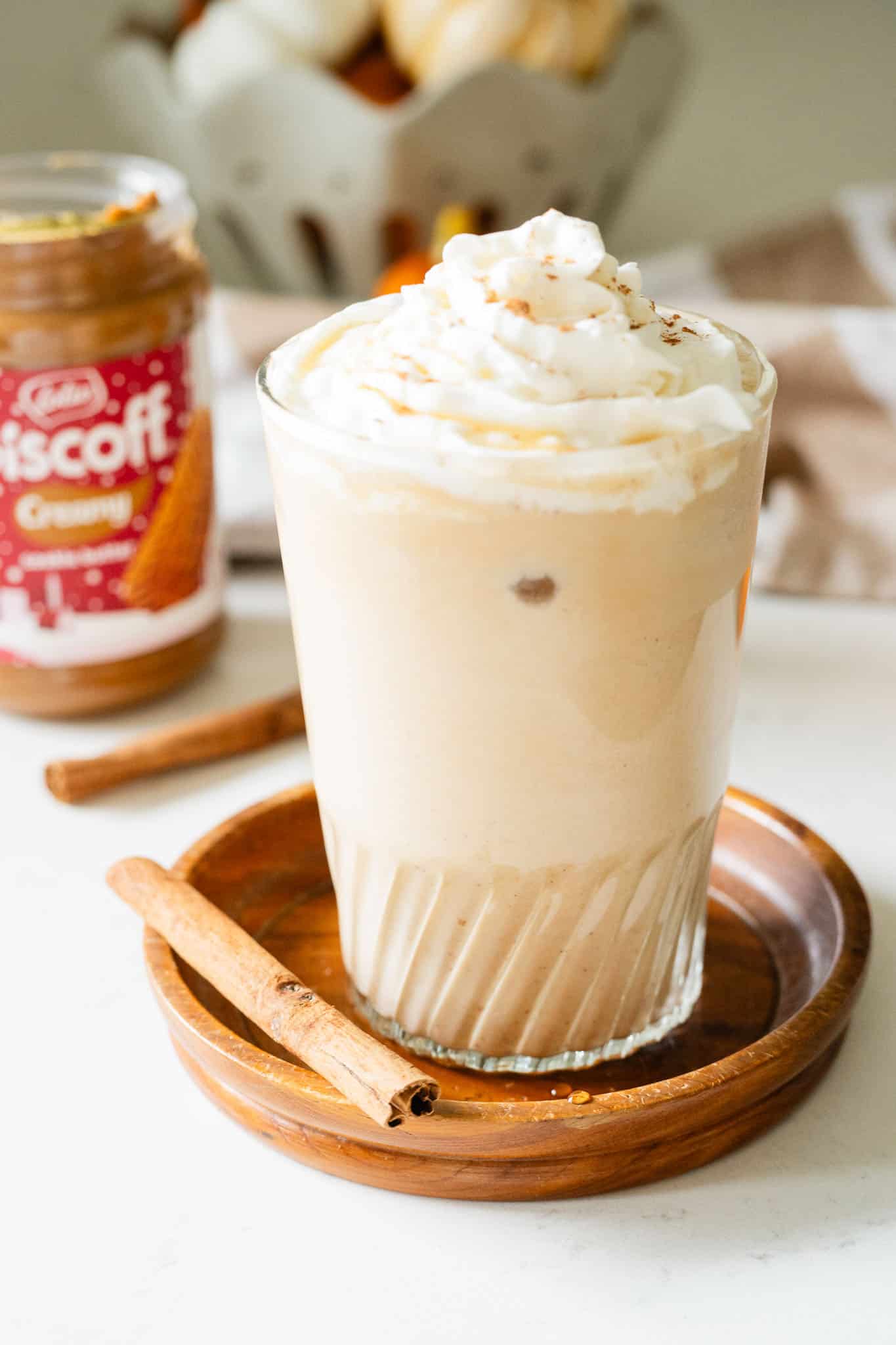 pumpkin drink with cookie butter jar in the back