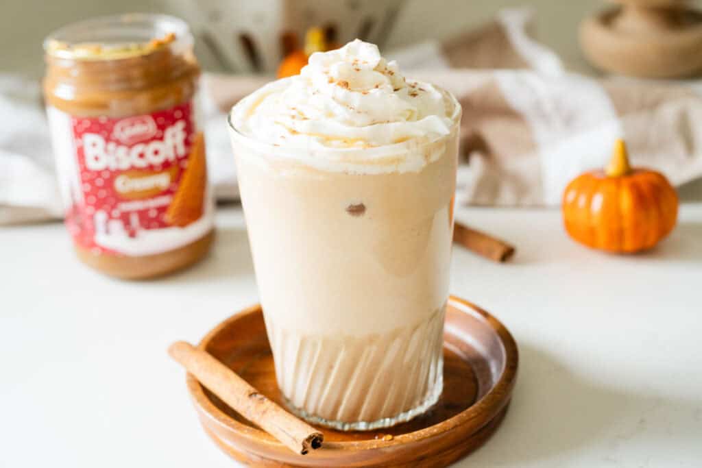 iced breve surrounded by cookie butter and orange pumpkins