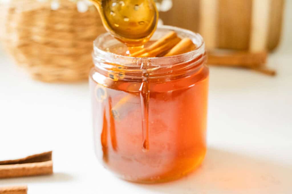 honey spilling out of a jar