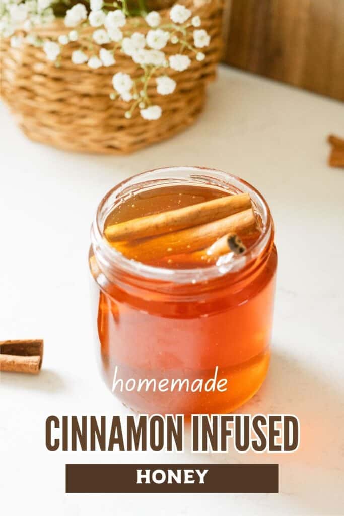 jar with cinnamon sticks and honey