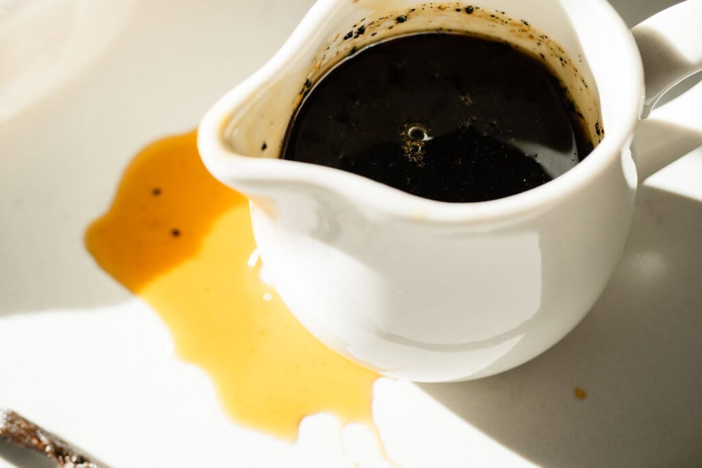 vanilla maple syrup spilled out of a pitcher