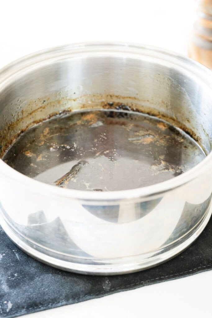 vanilla maple syrup cooling in a saucepan