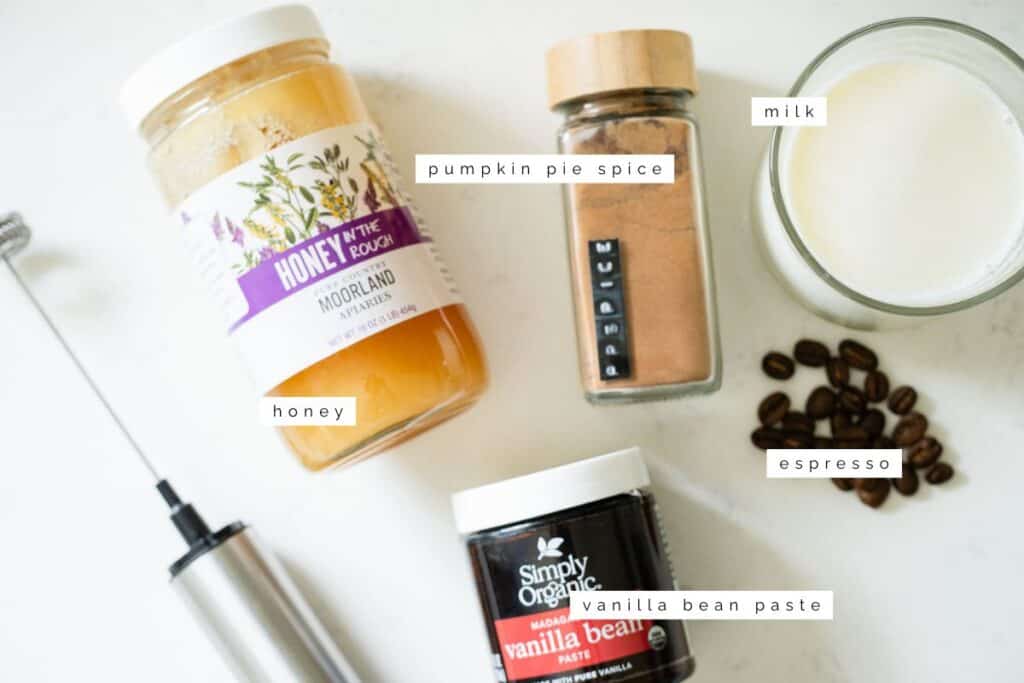 ingredients to make a healthy iced pumpkin spice latte