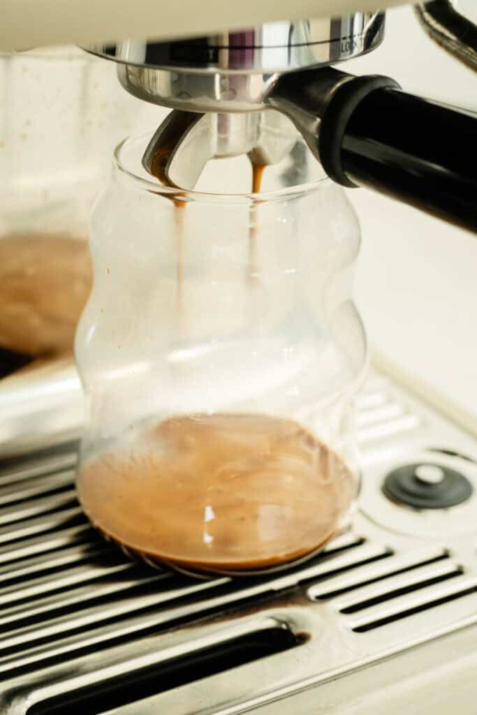 espresso brewing over maple syrup
