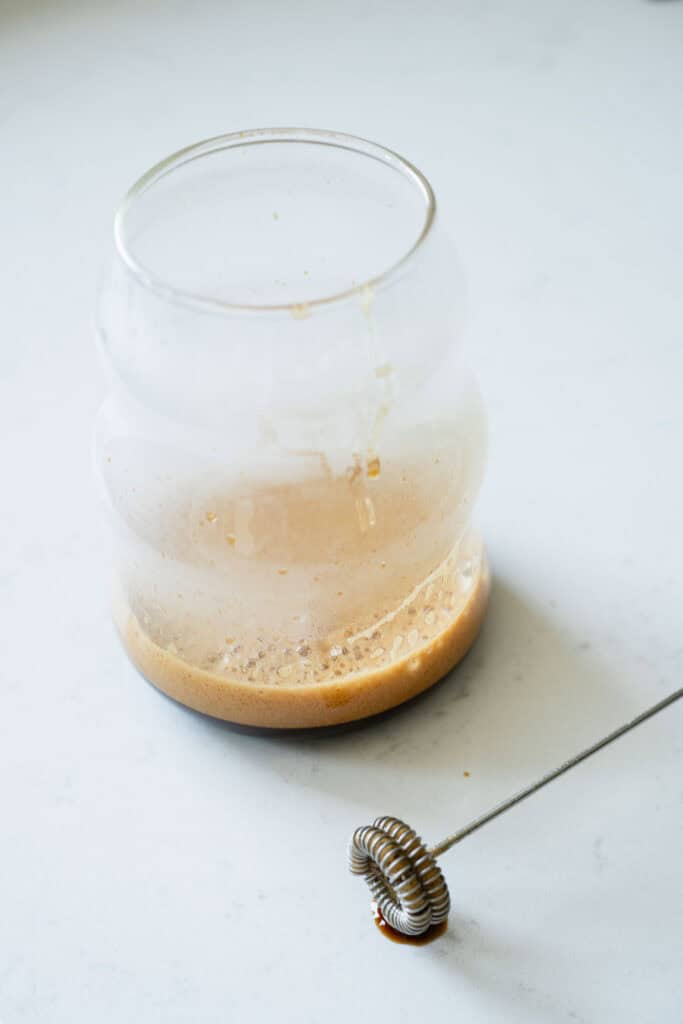 espresso and syrup frothed together