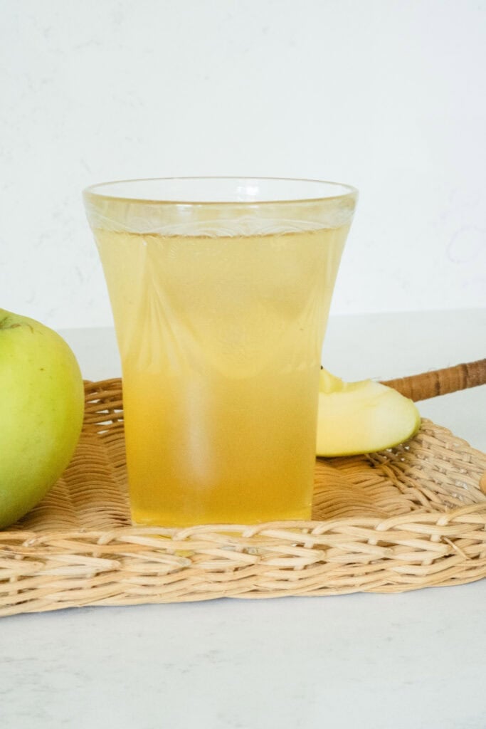 fizzy apple cider in a glass